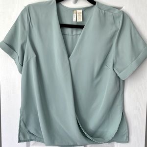 Light teal blouse